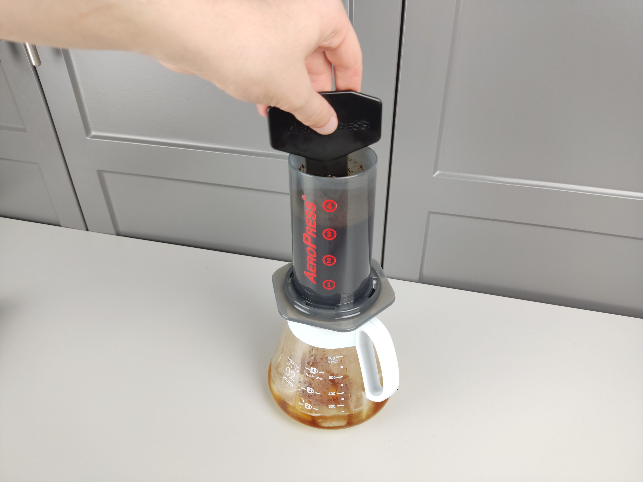 stirring coffee in aeropress