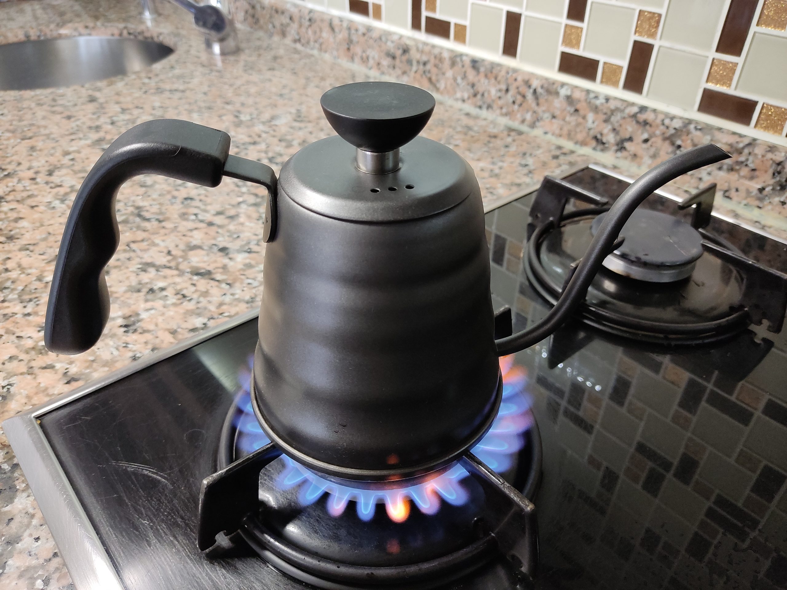 Gooseneck kettle on stove
