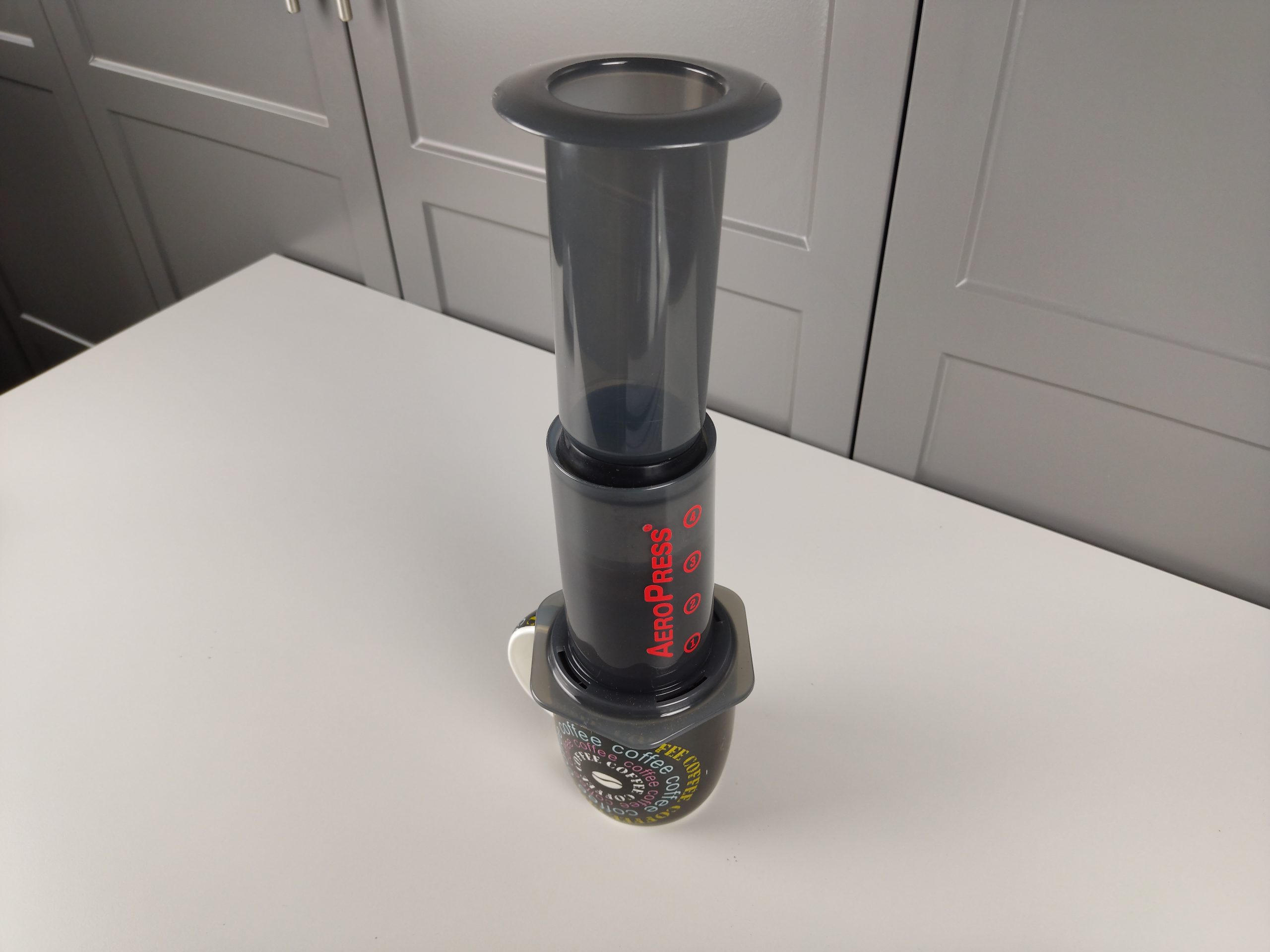 Insert the plunger of aeropress